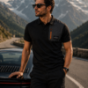 Dutch Peak premium black polo shirt for men with travel-inspired design Men's luxury automotive lifestyle polo shirt by Dutch Peak Premium black polo shirt for travelers and explorers Dutch Peak Explorer Polo Shirt front view Stylish men's polo shirt for road trips and casual wear Premium travel lifestyle clothing for men Black polo shirt with utility pocket detail Automotive fashion polo shirt for men Luxury casual polo shirt by Dutch Peak Explorer-inspired premium men's